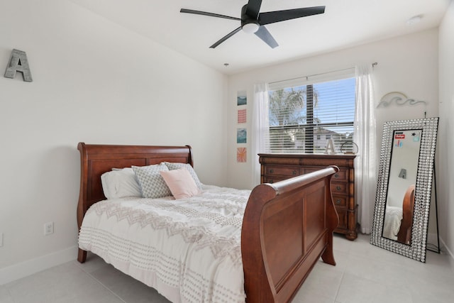 bedroom featuring ceiling fan and light tile patterned flooring