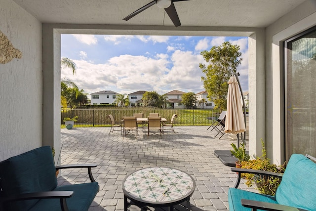 view of patio / terrace featuring ceiling fan