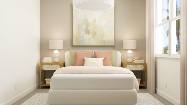 bedroom featuring light colored carpet and multiple windows