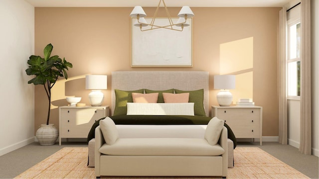 carpeted bedroom featuring a chandelier