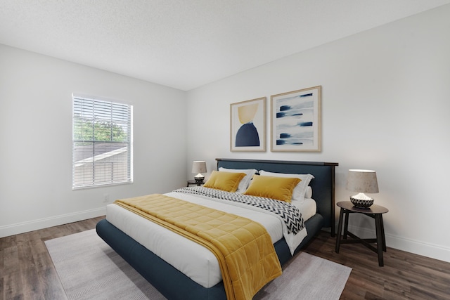 18520 SE Wood Haven Ln Unit I, Jupiter, FL 33469 - bedroom with wood finished floors and baseboards