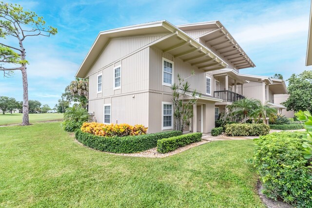 18520 SE Wood Haven Ln Unit I, Jupiter, FL 33469 - view of side of property with a yard