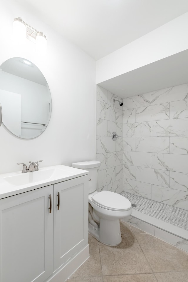 18520 SE Wood Haven Ln Unit I, Jupiter, FL 33469 - full bathroom featuring a tile shower, vanity, and toilet