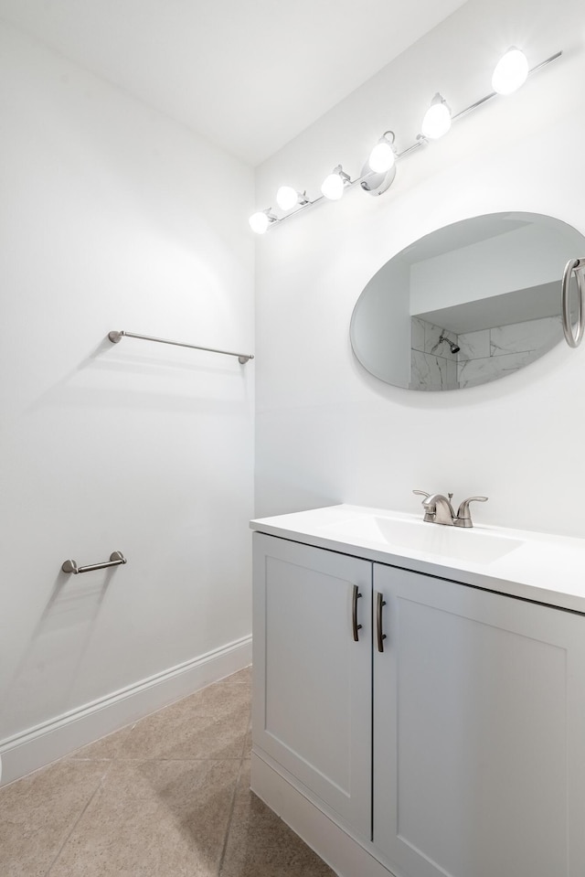 bathroom featuring tile patterned floors and vanity