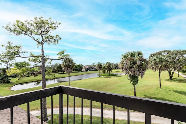 18520 SE Wood Haven Ln Unit I, Jupiter, FL 33469 - view of green lawn with a water view, a balcony, and view of golf course