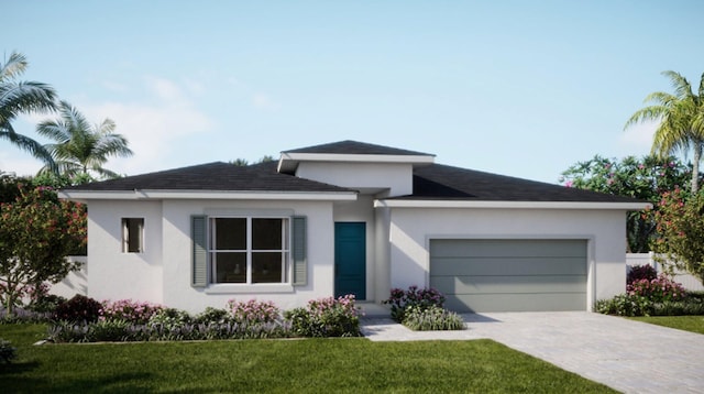 view of front of home featuring a garage, decorative driveway, and stucco siding