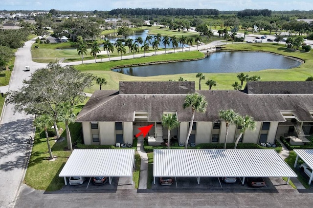 bird's eye view with a water view