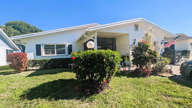 view of front of home with a front yard