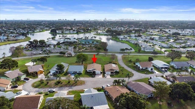 aerial view with a water view and a residential view