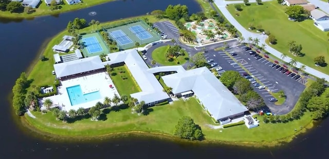 bird's eye view with a water view