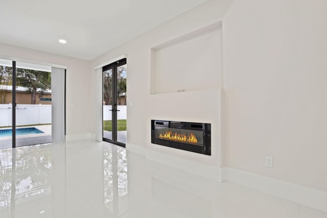 interior space with tile patterned flooring and french doors