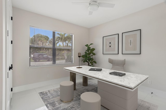 office area featuring ceiling fan and light tile patterned floors