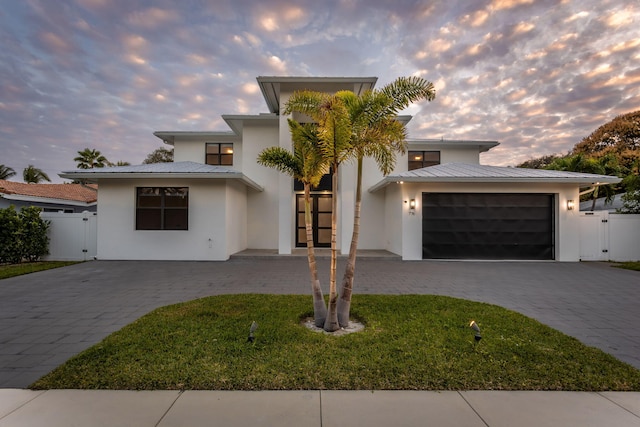 view of front of property with a garage