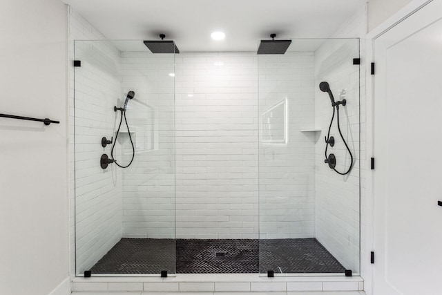 bathroom featuring an enclosed shower