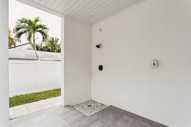 property entrance with a patio area