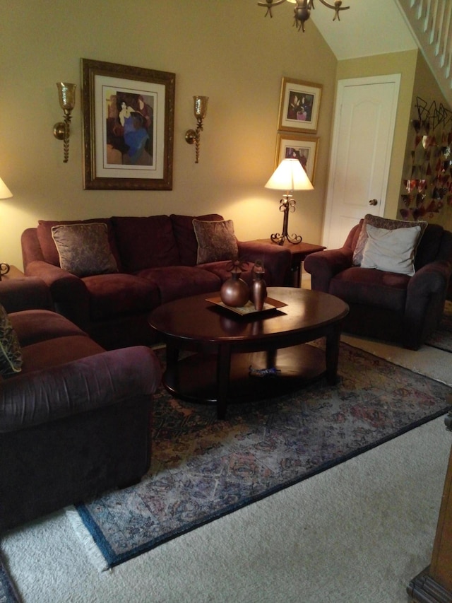 carpeted living room with lofted ceiling