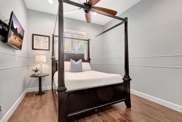 bedroom featuring ceiling fan and hardwood / wood-style floors