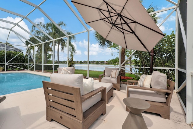 view of swimming pool featuring a lanai, an outdoor living space, a patio area, and a water view