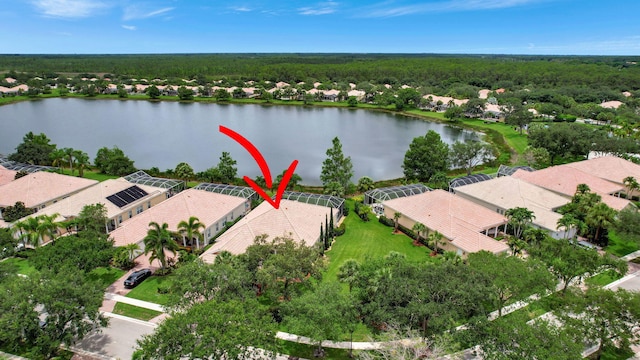 birds eye view of property featuring a water view