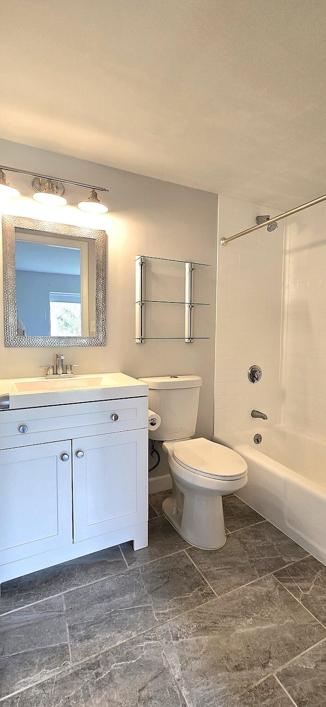 full bathroom with toilet, vanity, and shower / bath combination