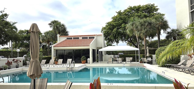 view of pool featuring a gazebo and a patio area