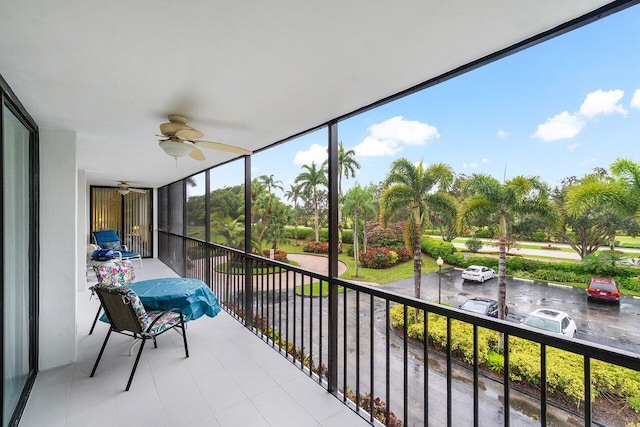 exterior space with ceiling fan