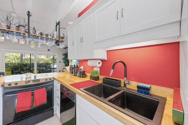 kitchen featuring wooden counters, dishwasher, electric stove, sink, and white cabinetry