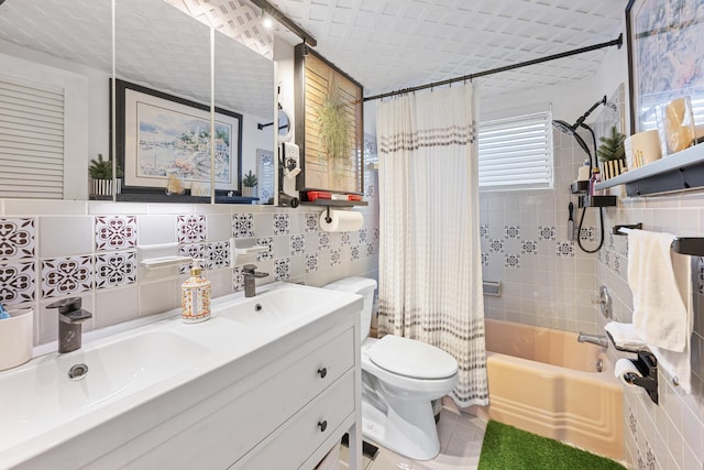 full bathroom featuring toilet, backsplash, tile patterned floors, shower / tub combo, and vanity