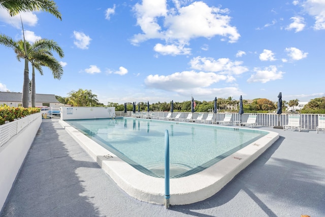 view of swimming pool featuring a patio