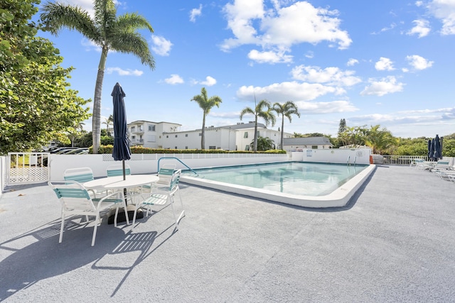 view of pool featuring a patio area