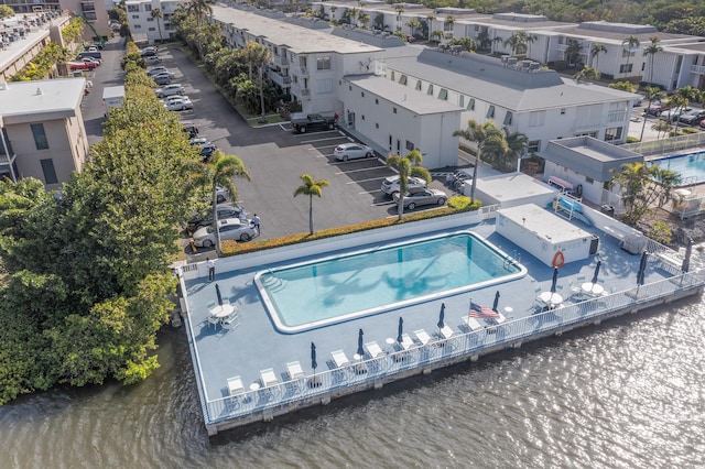 birds eye view of property featuring a water view