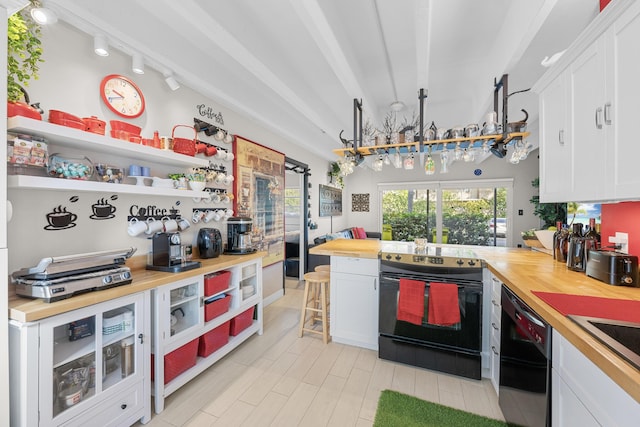 kitchen featuring white cabinetry, track lighting, wooden counters, black appliances, and beam ceiling