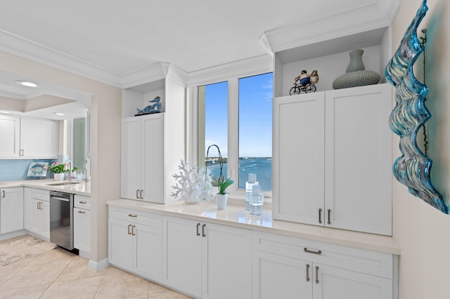 kitchen featuring white cabinets, a water view, dishwasher, and ornamental molding