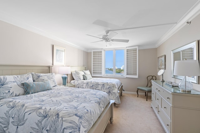 bedroom with ceiling fan, ornamental molding, and light carpet