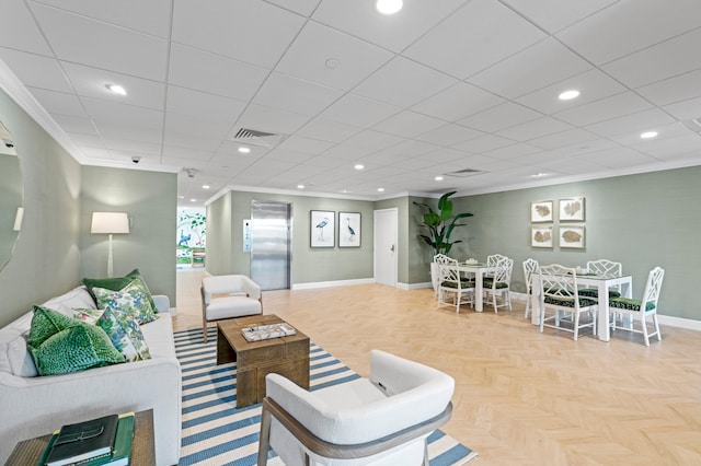 living room featuring elevator, light parquet flooring, and ornamental molding