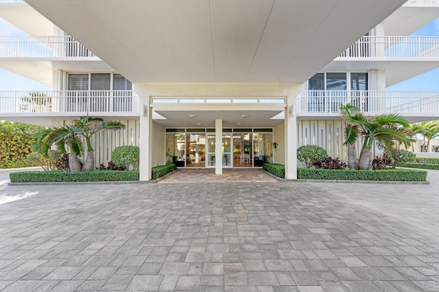 property entrance featuring french doors