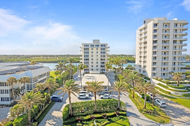 view of building exterior with a water view