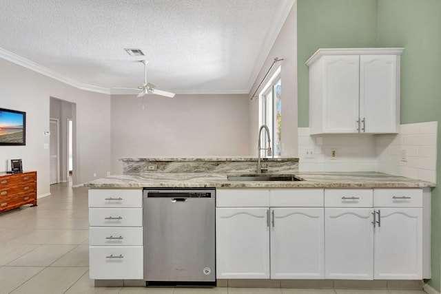 kitchen featuring ceiling fan, dishwasher, sink, decorative backsplash, and white cabinets