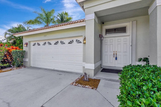 entrance to property with a garage