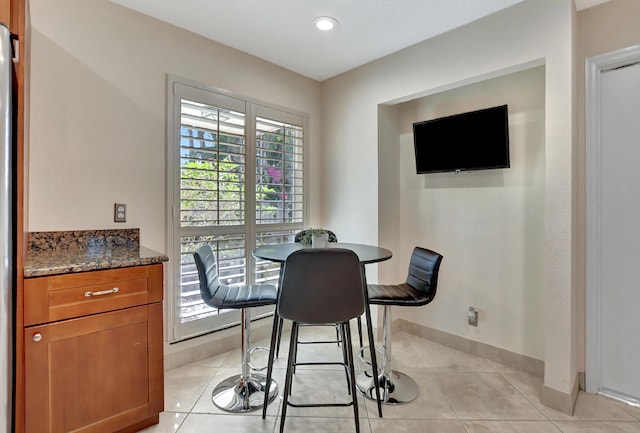 view of tiled dining space