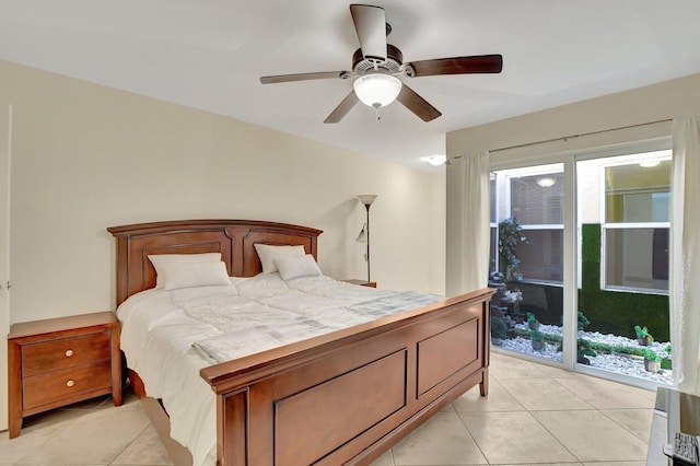 tiled bedroom with ceiling fan