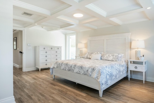 2897 SE Saint Lucie Blvd, Stuart, FL 34997 - bedroom with visible vents, coffered ceiling, wood finished floors, and beamed ceiling