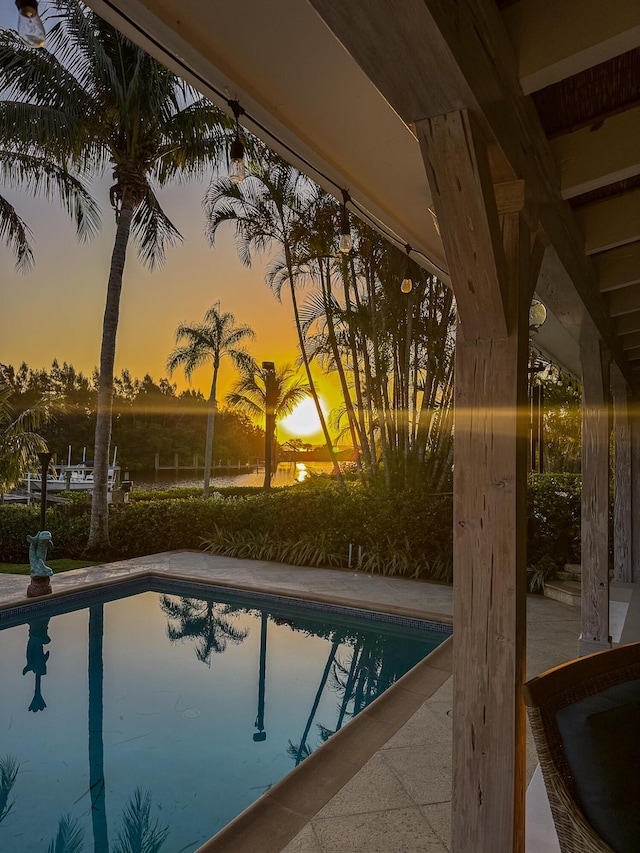 2897 SE Saint Lucie Blvd, Stuart, FL 34997 - pool at dusk with an outdoor pool