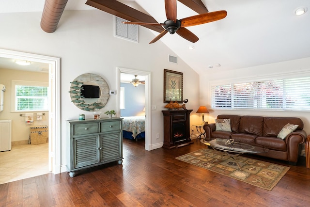 2897 SE Saint Lucie Blvd, Stuart, FL 34997 - living room with visible vents, a ceiling fan, dark wood-type flooring, and high vaulted ceiling