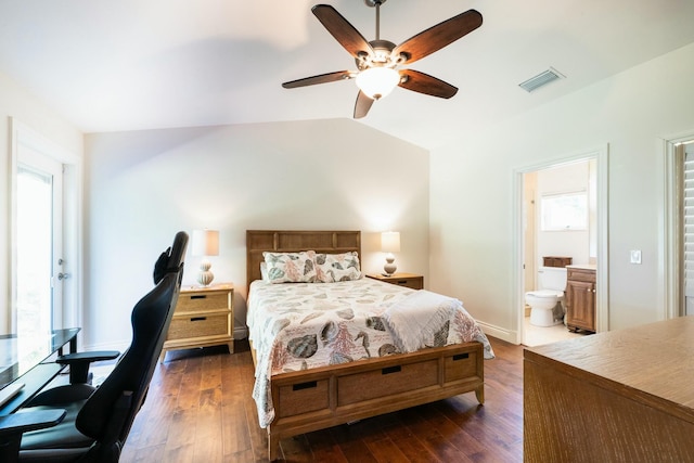 2897 SE Saint Lucie Blvd, Stuart, FL 34997 - bedroom featuring visible vents, connected bathroom, dark wood-style flooring, and multiple windows