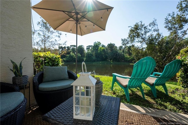 view of patio / terrace with a water view