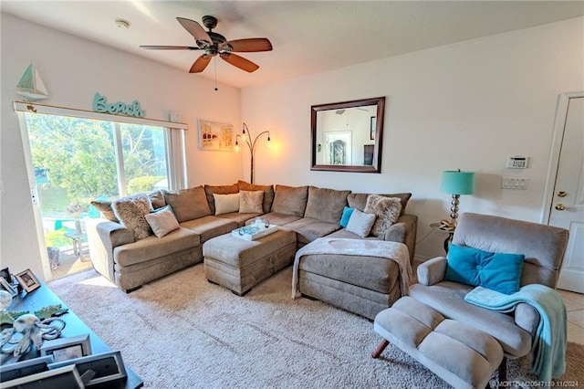 tiled living room with ceiling fan