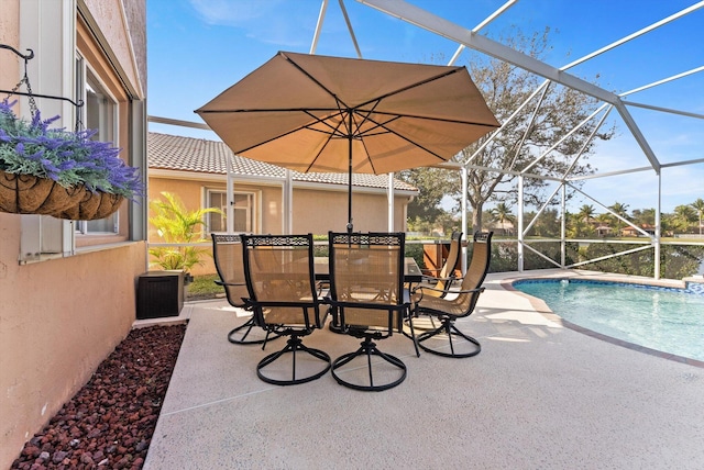 view of pool featuring a lanai and a patio area