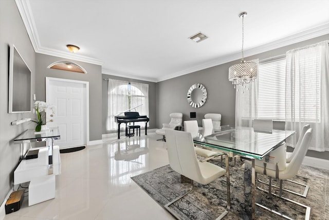 tiled dining area featuring crown molding and a notable chandelier