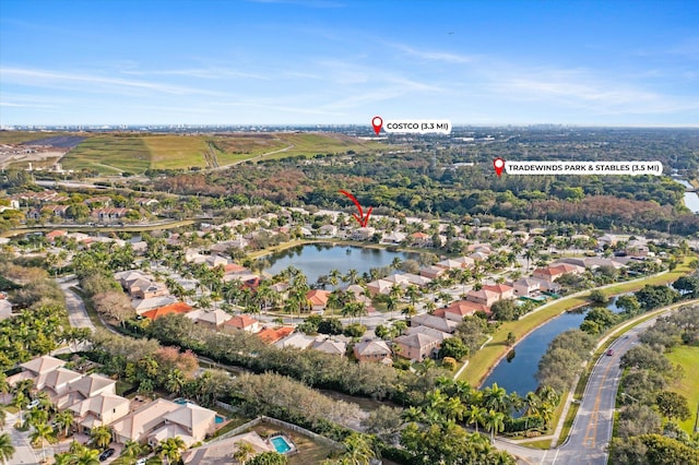 birds eye view of property featuring a water view